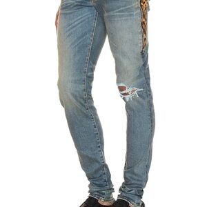 AMIRI  AUTHENTIC  CHEETAH / LEOPARD PRINT Blue Skinny Jeans Distressed Detail